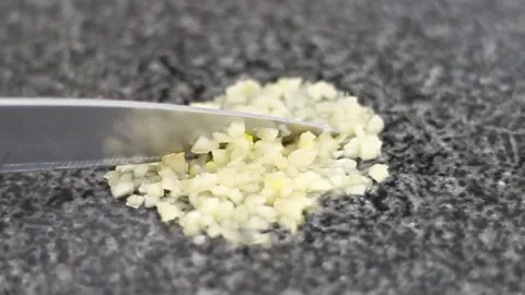 mincing frozen garlic cloves